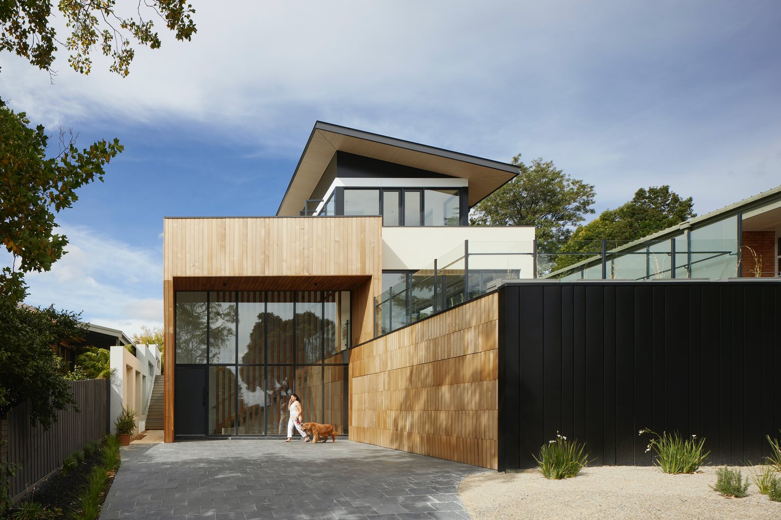 Modern landed home rebuild with glass facade